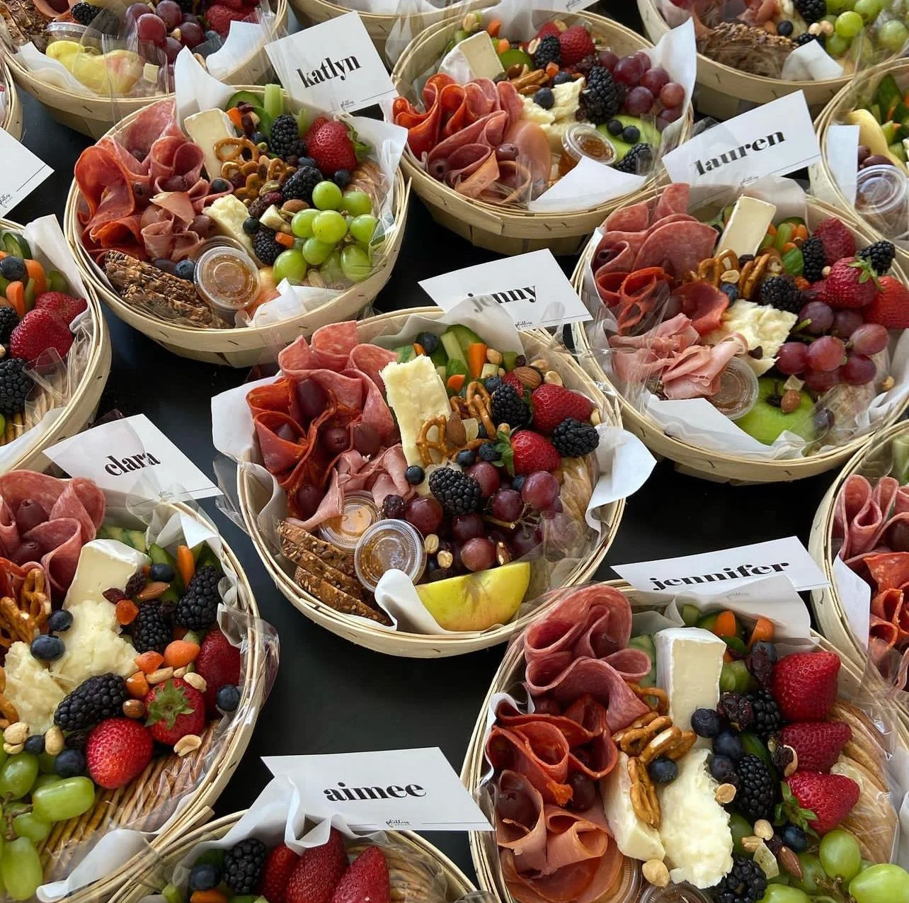 Personalized individual charcuterie baskets with guest name cards
