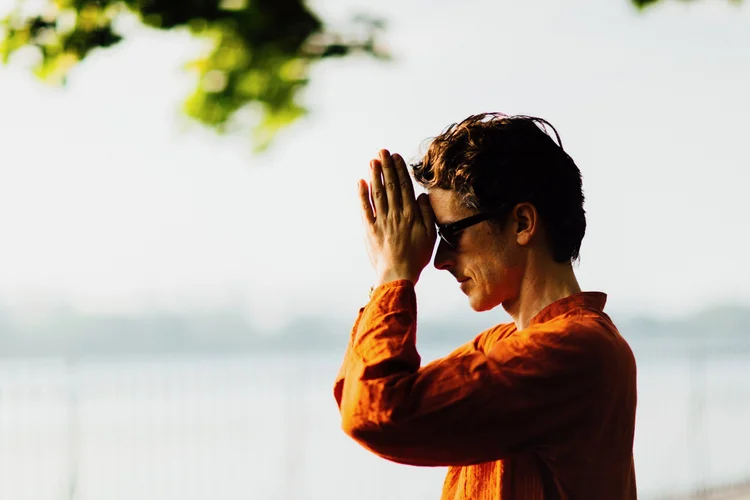 Devotional kirtan gestures at a gathering