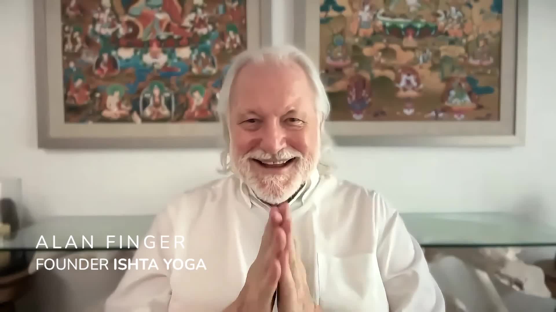 Alan Finger, founder of ISHTA Yoga, in namaste — teacher training video still