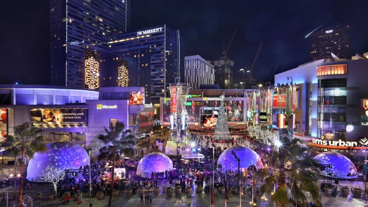 Aerial night view of outdoor event at LA Live with illuminated domes and Star Wars branding