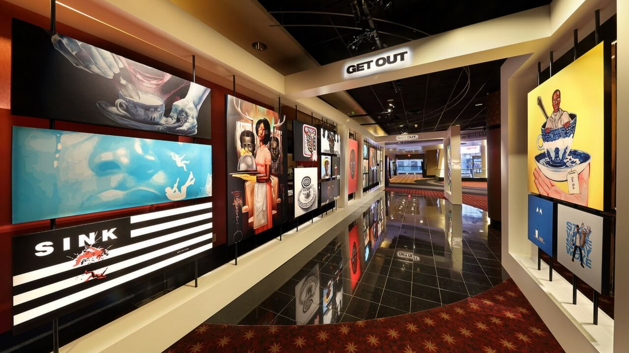 Get Out movie fan art gallery activation hallway with large format prints along walls