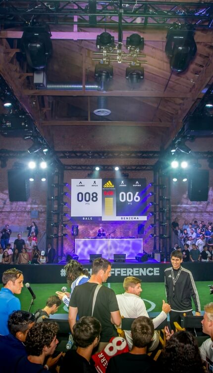 Indoor Adidas brand activation with scoreboard and crowd