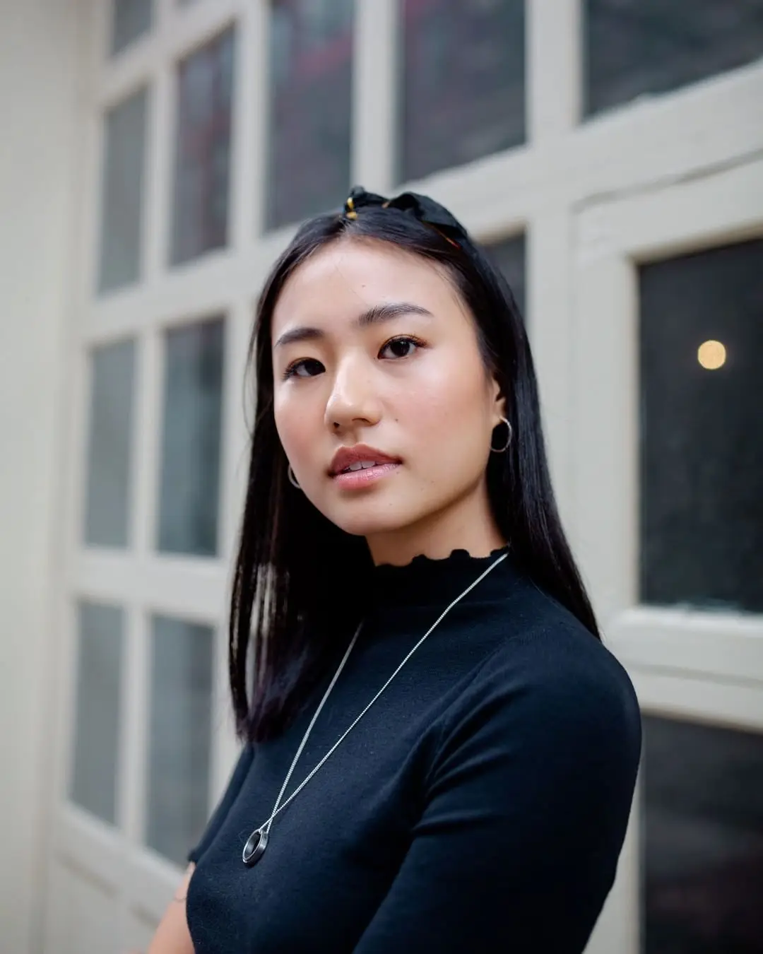 Portrait of Annie in a black turtleneck