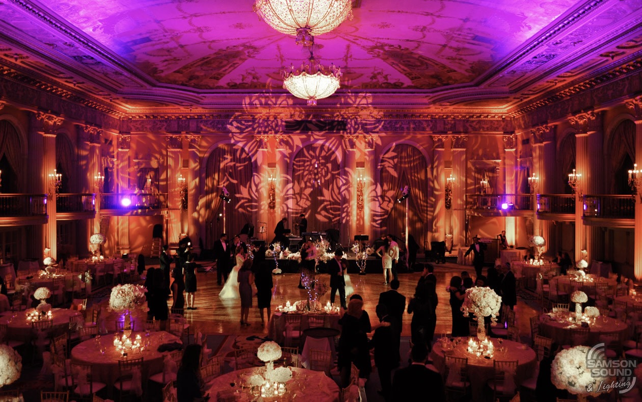 Grand ballroom with pink and purple event lighting