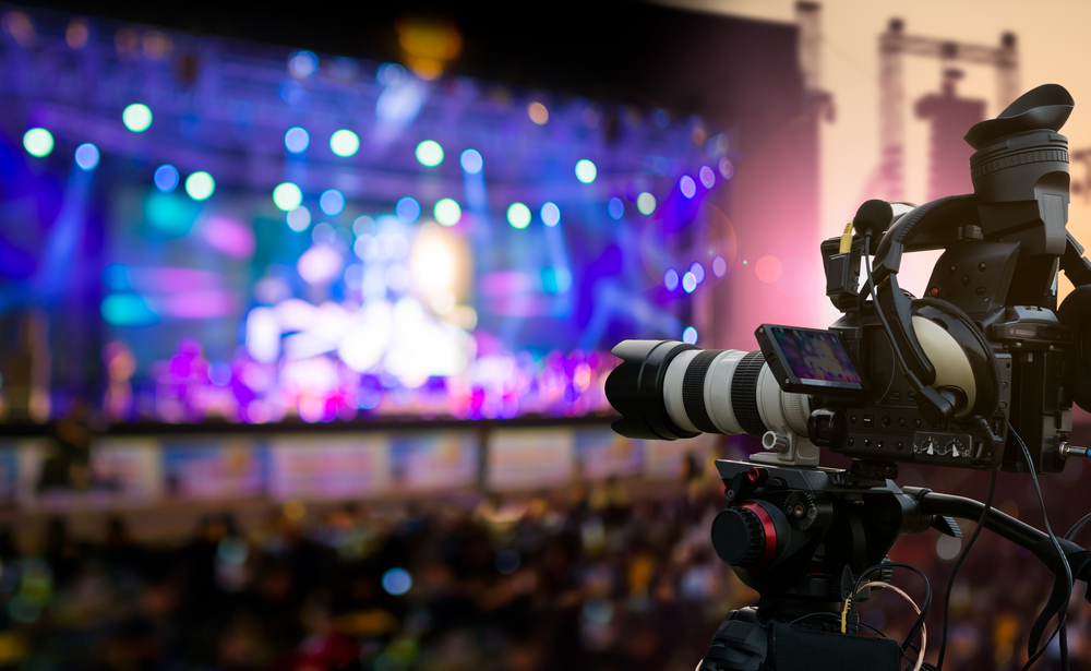 Video camera on a lit concert stage