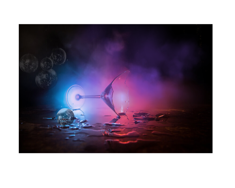 Disco balls and neon smoke filling a dark event space