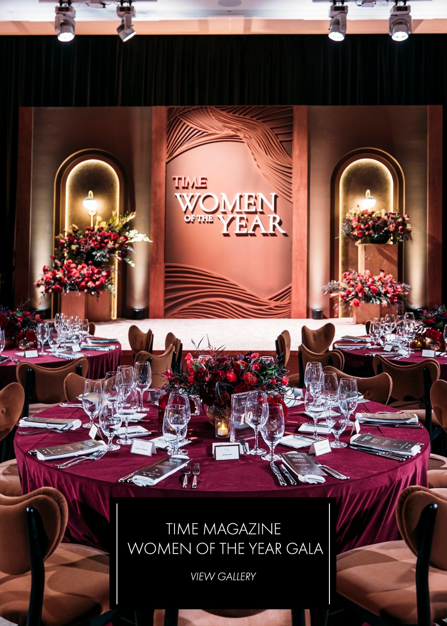 TIME Magazine Women of the Year Gala — stage backdrop close-up with ornate arches and red floral arrangements