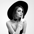 Portrait of Wendy Paige Sterling in a wide-brim hat