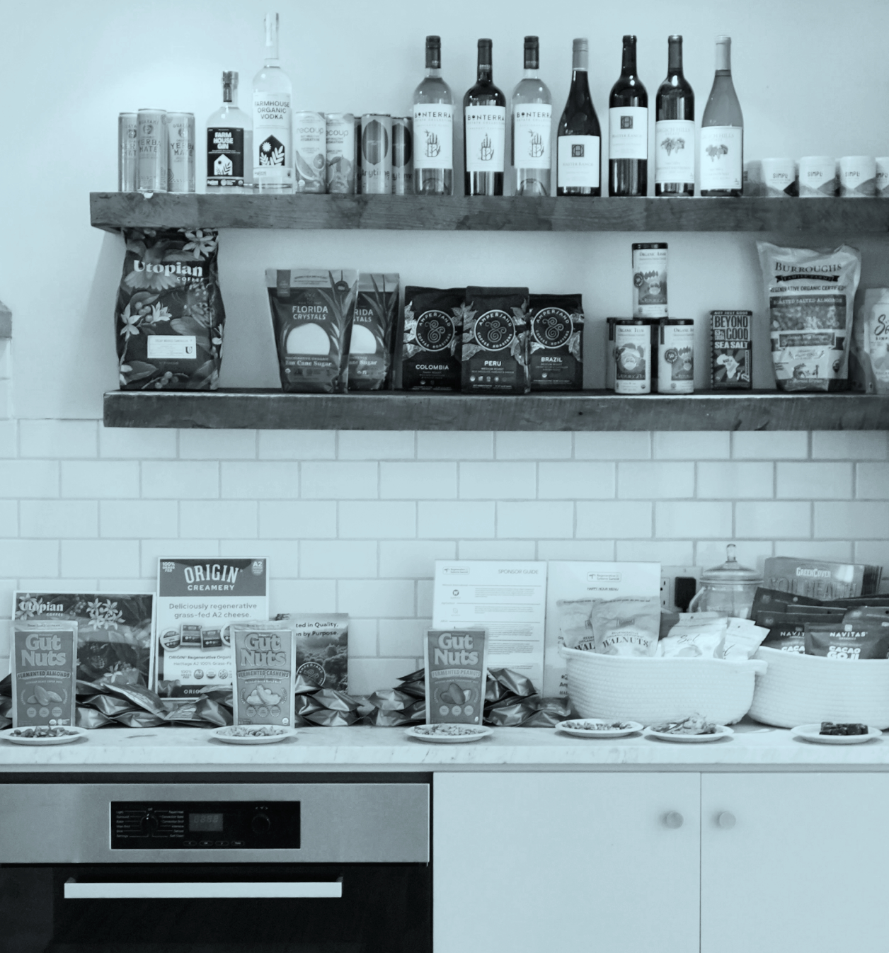 Black and white photo of shelves stocked with regenerative brand products
