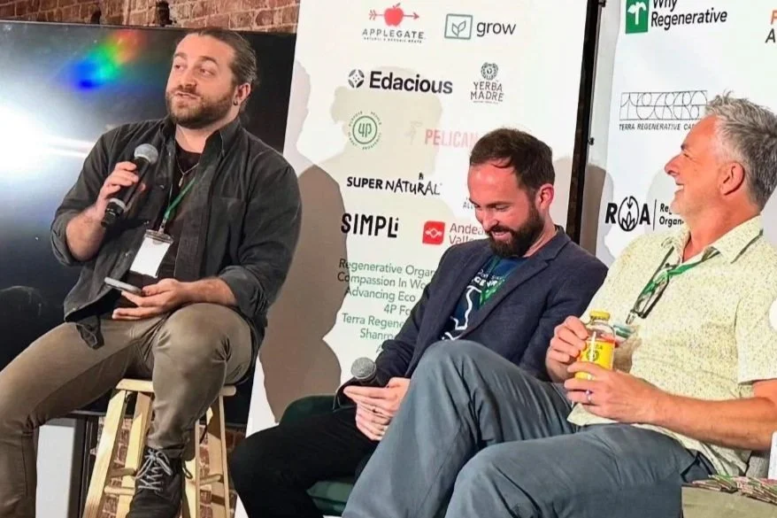 Three speakers on stage at the Rhode to Regenerative conference