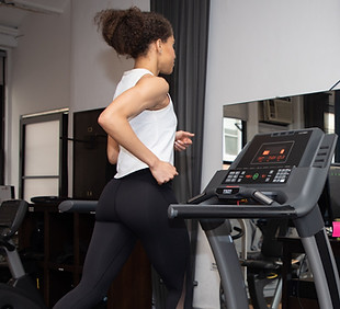 Athlete running on a treadmill during a performance assessment