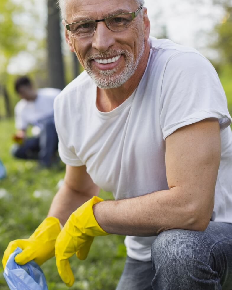 A smiling older man outdoors